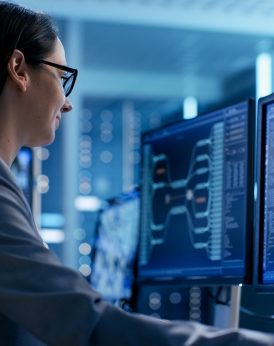 Close-up Shot of Female IT Engineer Working in Monitoring Room.